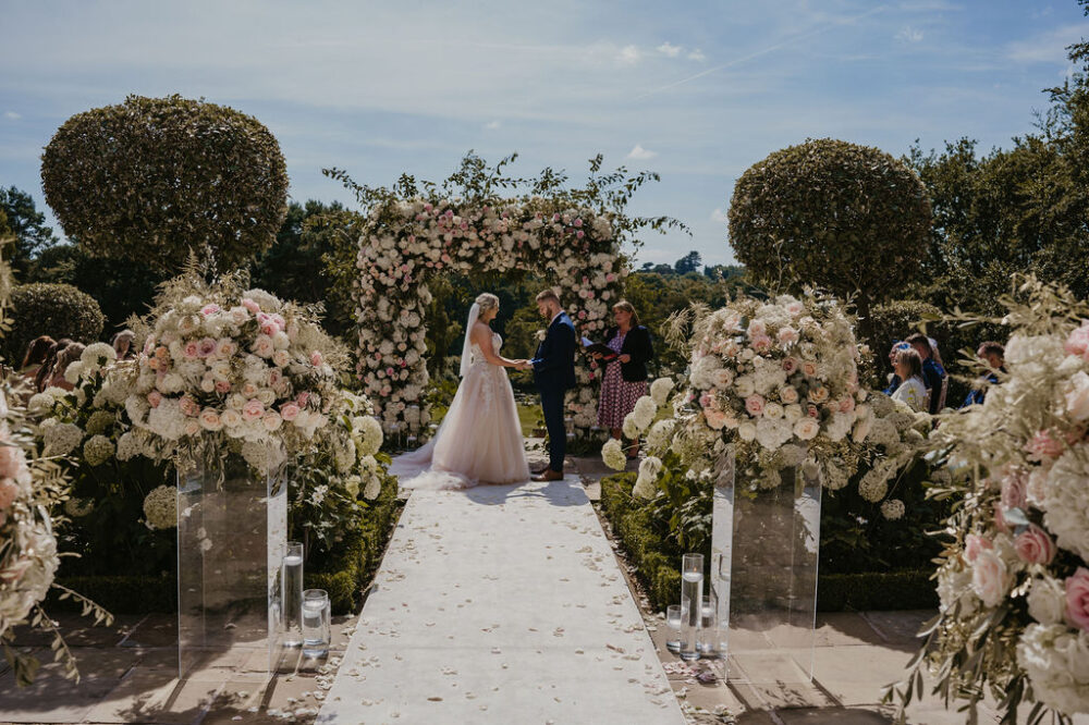 Couple getting married on the Terrace at Delamere Manor