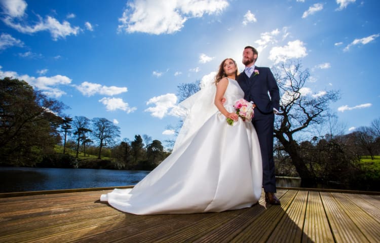 Wedding Couple standing on Jetty